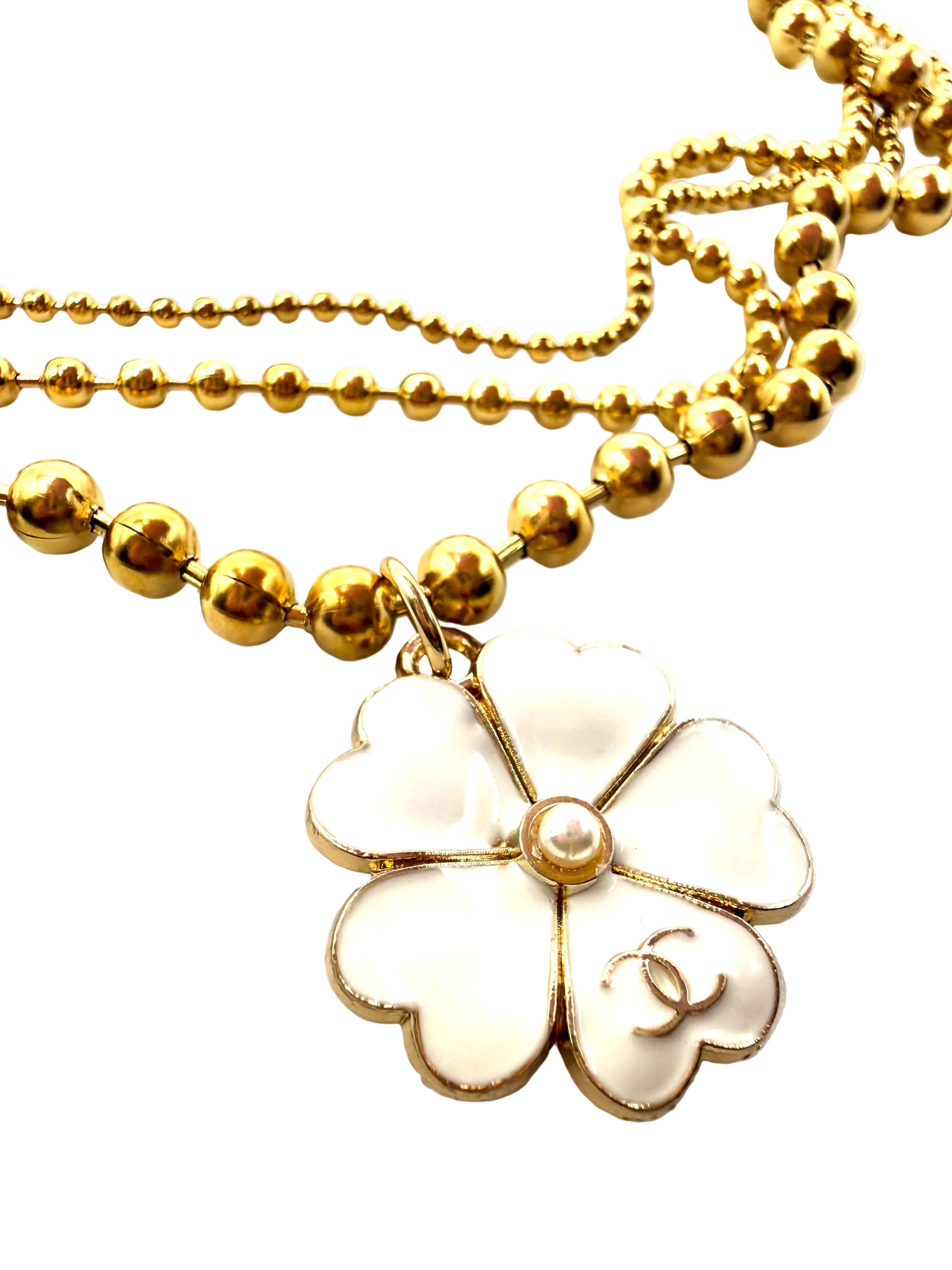 REPURPOSED WHITE FLOWER CHARM THREE LAYER NECKLACE